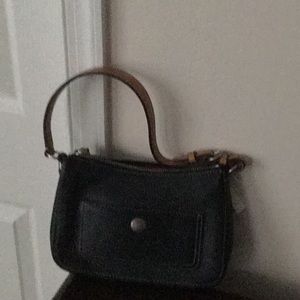Coach leather bag with red interior